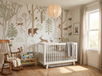Frisky Forest Green Mural in nursery with crib